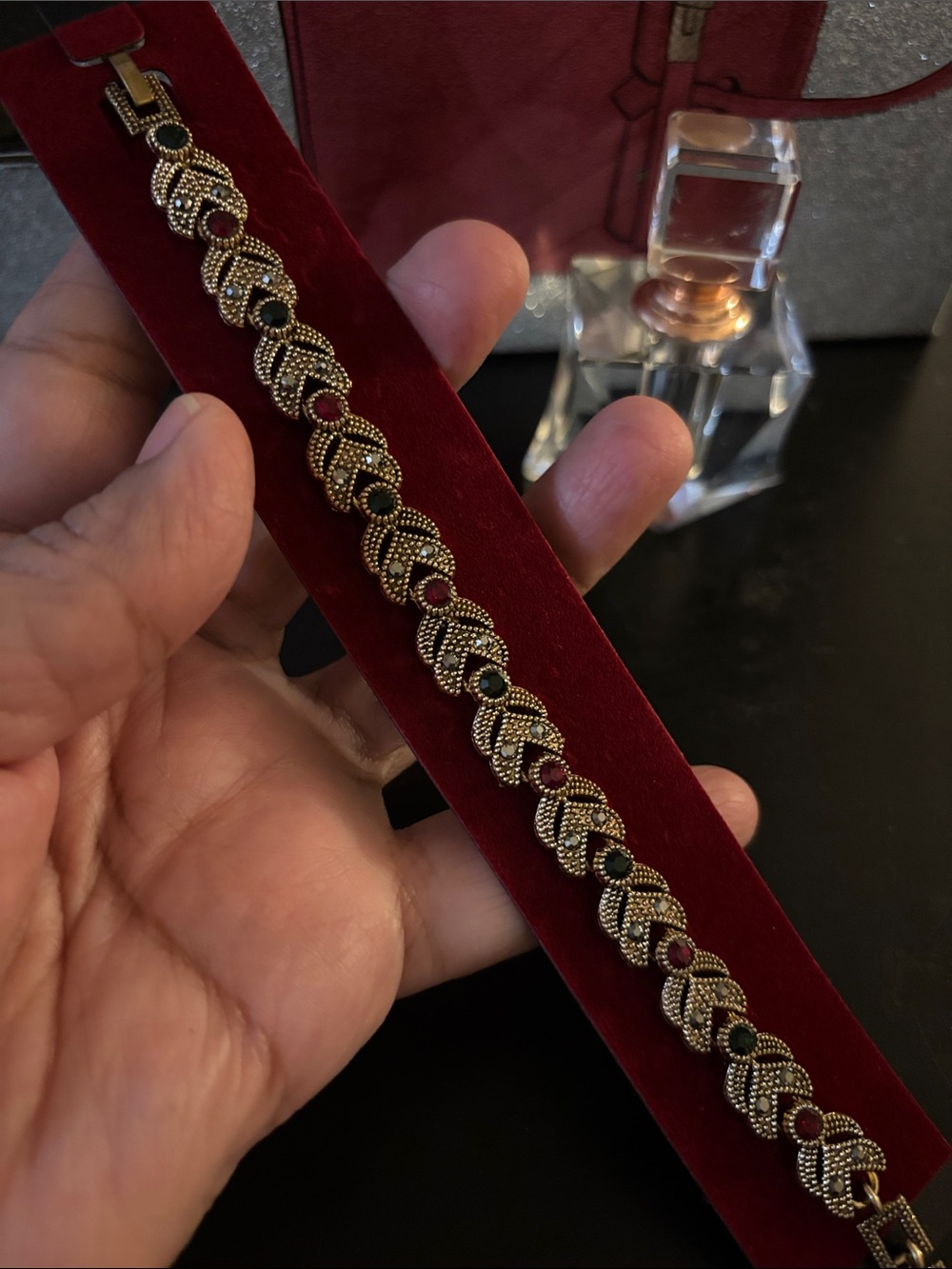 Gold-Tone Bracelet with Red and Green Accent Stones